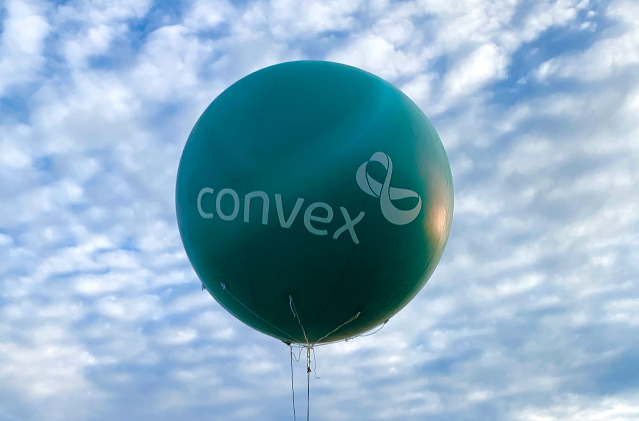 Large branded balloon in the sky